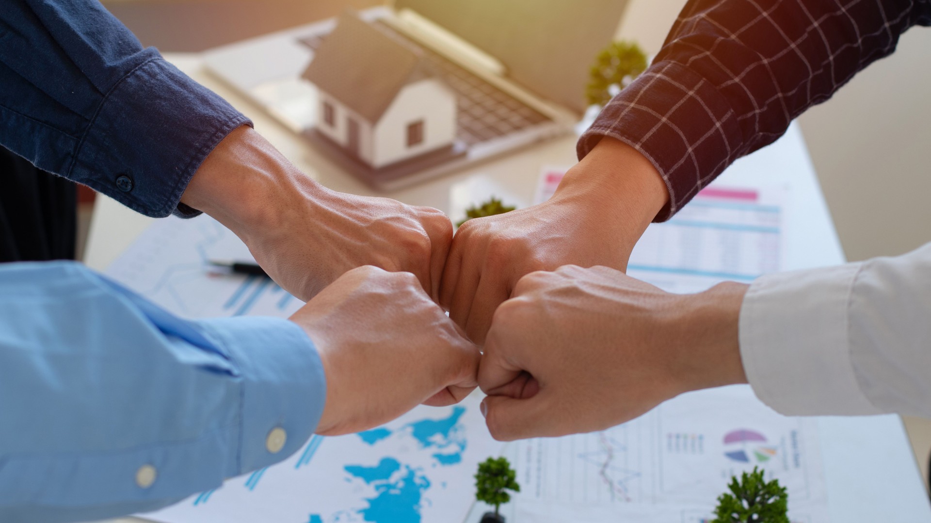 Corporate strategy focused on Environmental, Social, and Governance (ESG). People join for cooperation success. sustainable development goal. Business teamwork and partnerships. Eco-friendly. estate.
